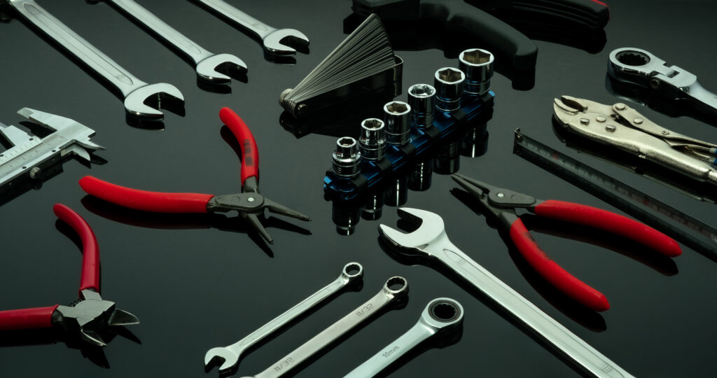 Set of mechanic tools. Chrome wrenches or spanners, hexagon sock Set of mechanic tools. Chrome wrenches or spanners, hexagon socket, end cutter pliers, locking pliers, vernier caliper, pincers, feeler gauge, and tape measure. Chrome vanadium spanner wrench.